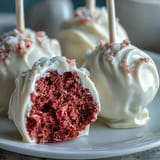 Delightful pink velvet cake pops coated in creamy white chocolate, perfect for Galentines celebrations and friendship gatherings.  