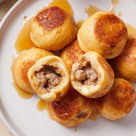 These mini pancake bites, filled with sausage or fruit, look incredible and taste amazing.
